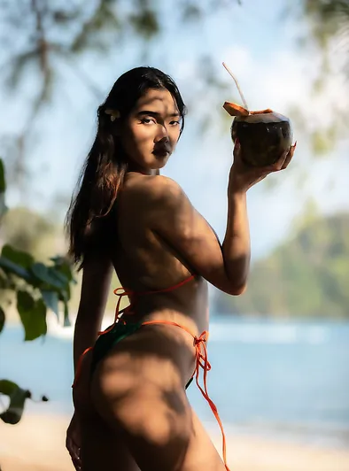 Minari takes her bikini off at the beach