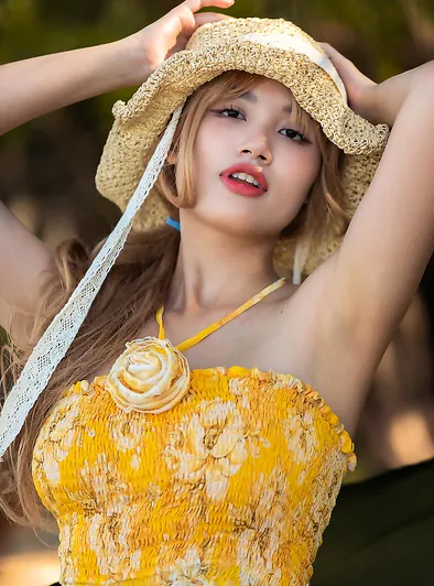 Danny Bends Over to Show Her Cute Pussy on the Beach