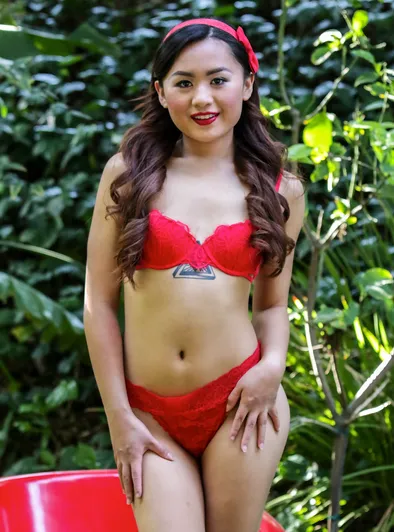 Phoebe Kalib Spreads Hairy Pussy on Red Chair Outdoors