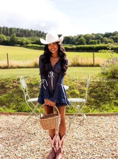 Putri Cinta Strips Nude Cowboy Style Outdoors