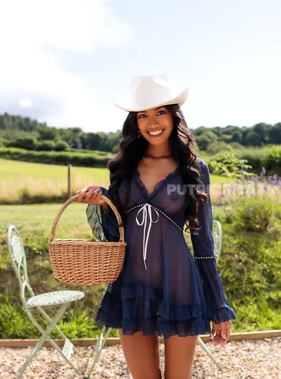 Putri Cinta Strips Nude Cowboy Style Outdoors