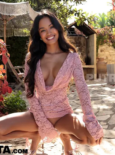 Putri Cinta Smiles As She Poses Nude Outdoors