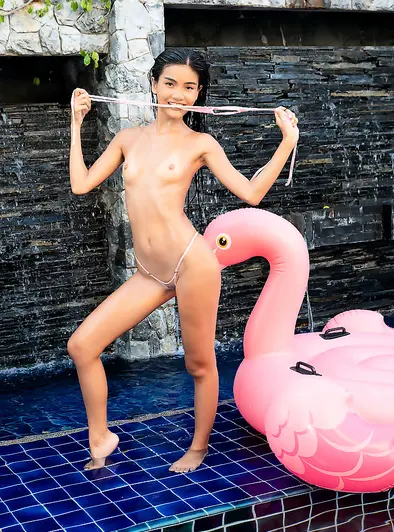 Vina Rae's Playful Nude Pool Day Tease