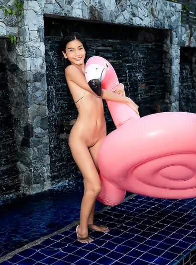 Vina Rae's Playful Nude Pool Day Tease