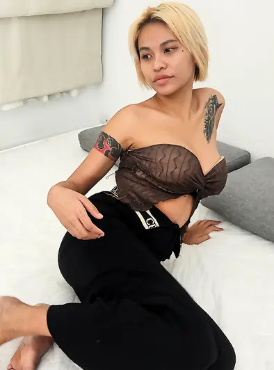 Tattooed Blonde Thai Girl Works That Cock