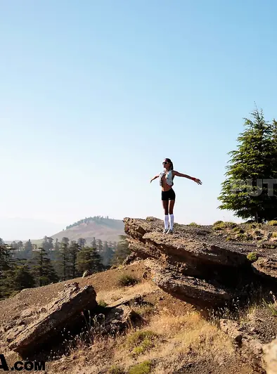 Putri Cinta Goes Topless On A Sunny Trail