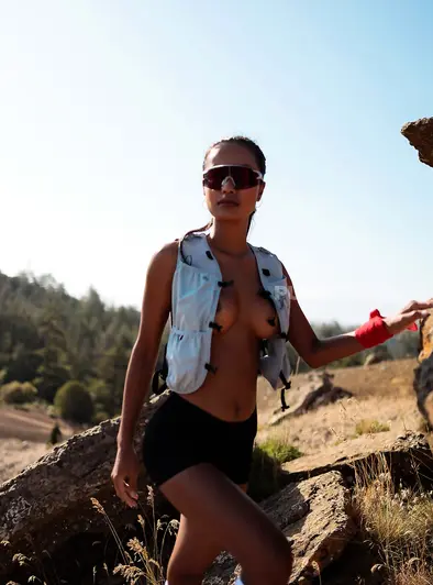 Putri Cinta Goes Topless On A Sunny Trail