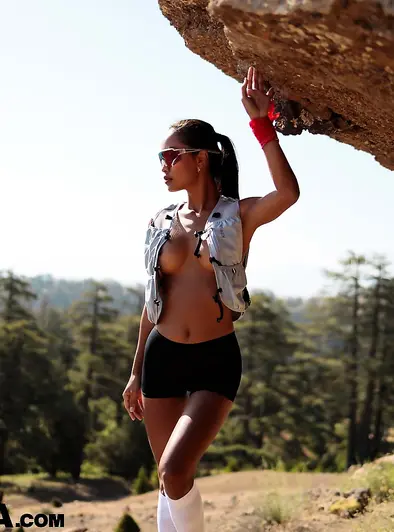 Putri Cinta Goes Topless On A Sunny Trail