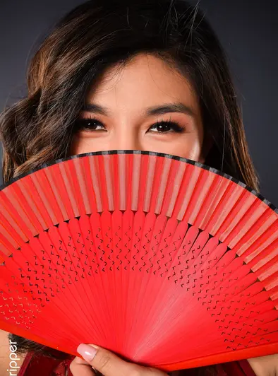 Clara Trinity Smiles While She Strips In Red